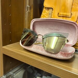 Miu Miu Gold and Black Fashion Sunglasses